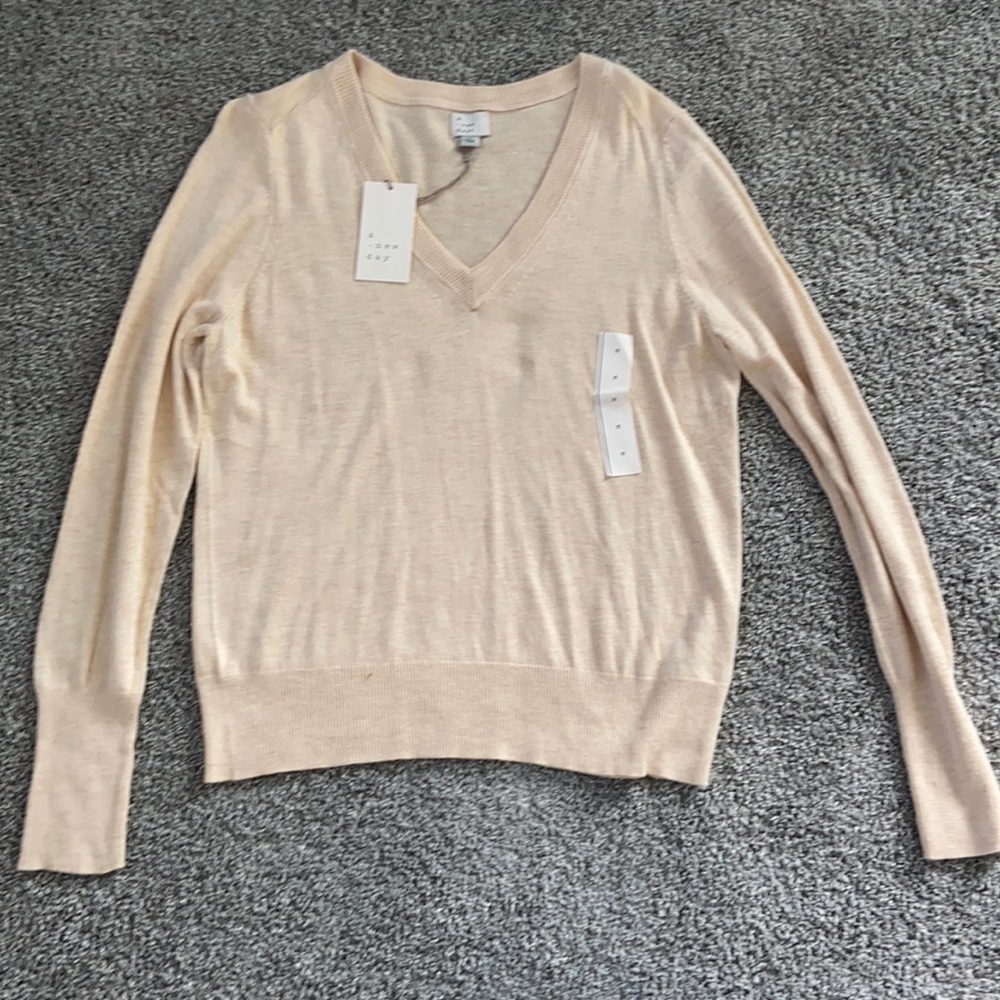 A New Day V Neck cream fitted sweater size medium